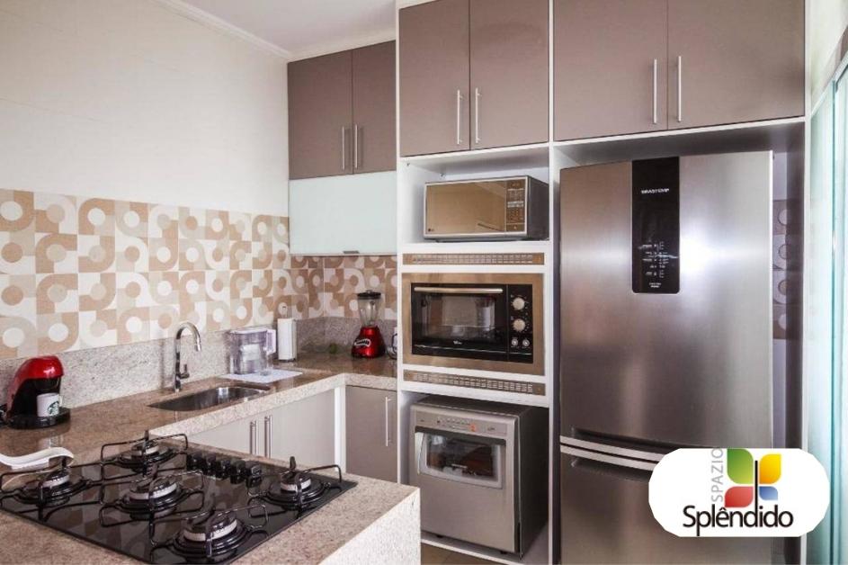 Cozinha planejada com eletrodomésticos - Apartamento Sorocaba